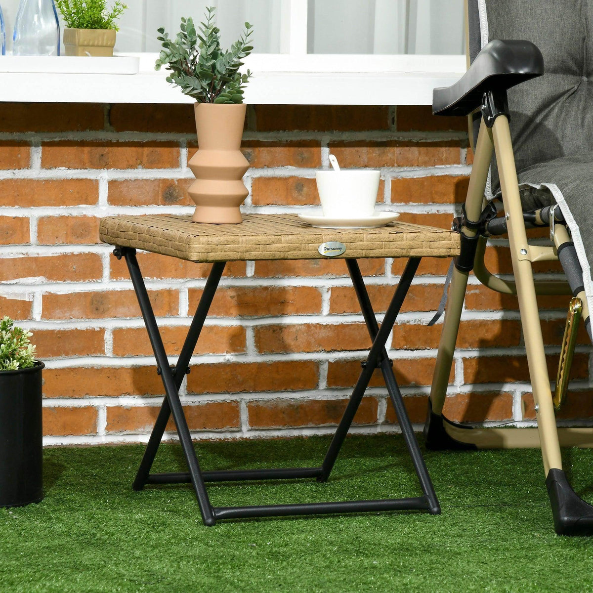 Natural rattan square folding bistro coffee table with black X-frame legs