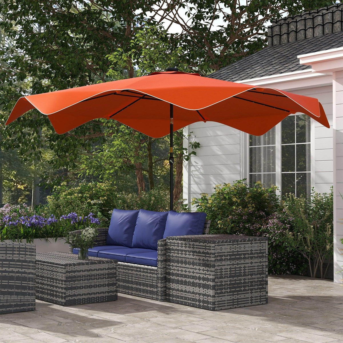 Orange patio market umbrella with scalloped canopy and central pole, outdoor seating