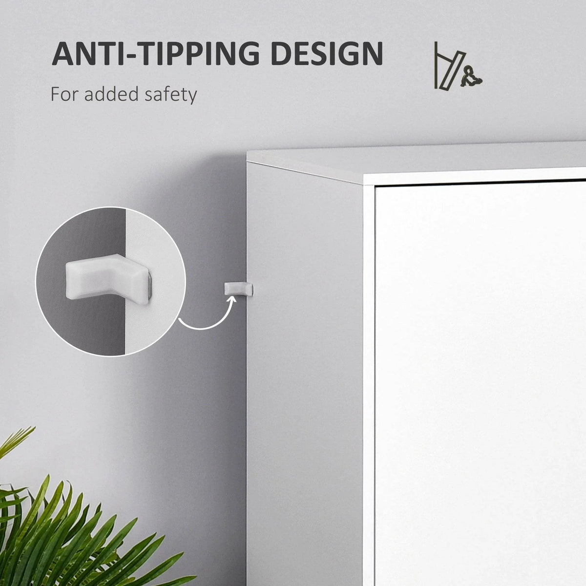 Anti-tipping wall strap and hinge attachment on a white wardrobe cabinet corner