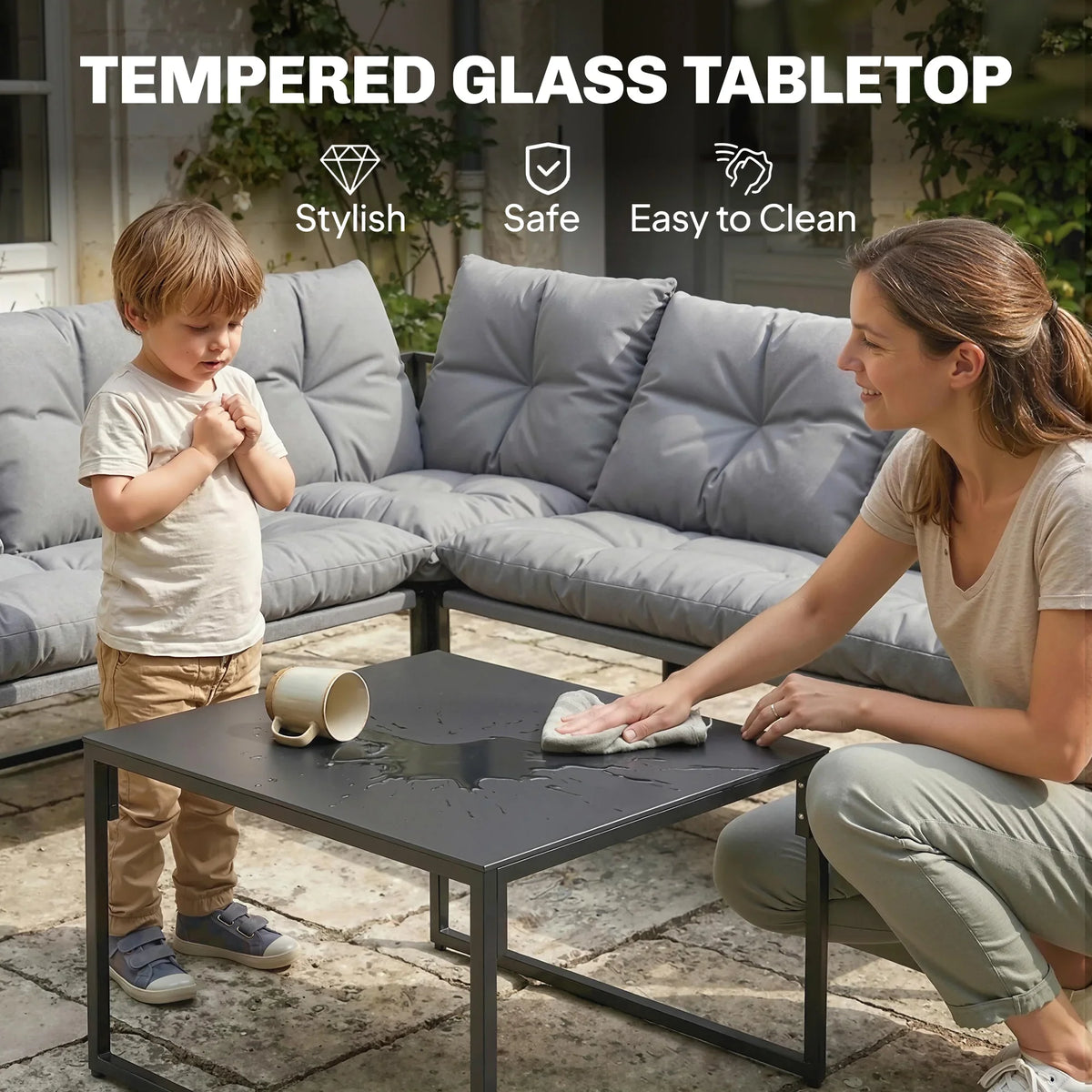 Grey outdoor sectional sofa set with black coffee table and tempered glass top