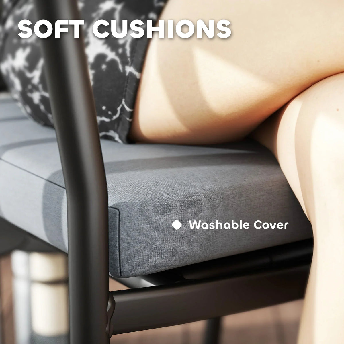 Grey upholstered chair seat cushion with washable cover detail on black frame