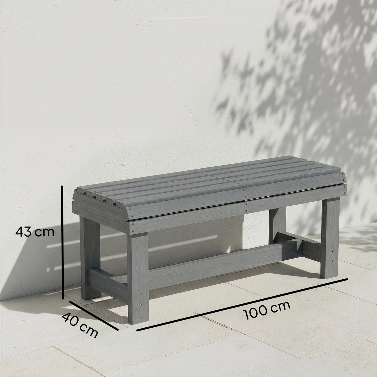 Grey 2-seat outdoor bench, slatted top and curved seat, supported by side frames.