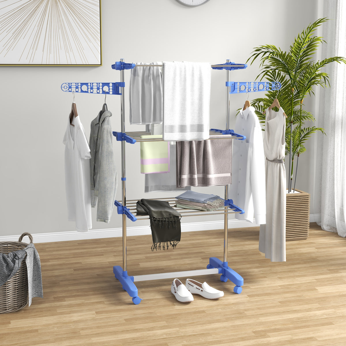 Blue three-shelf collapsible clothes horse with side arms and wheeled base