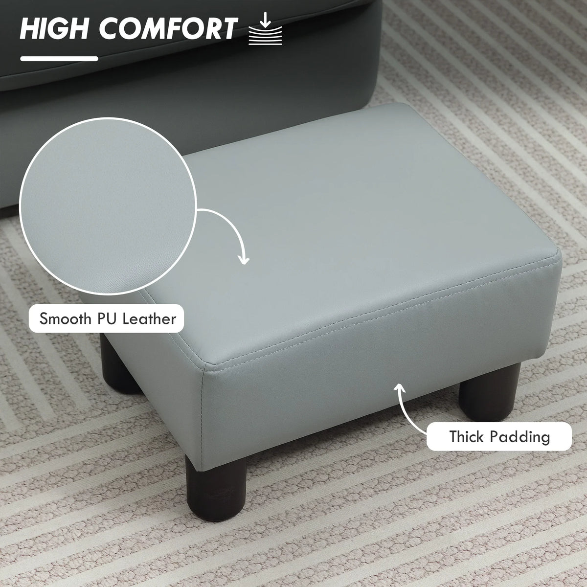 Gray PU leather footstool with thick padded cushion and four plastic legs
