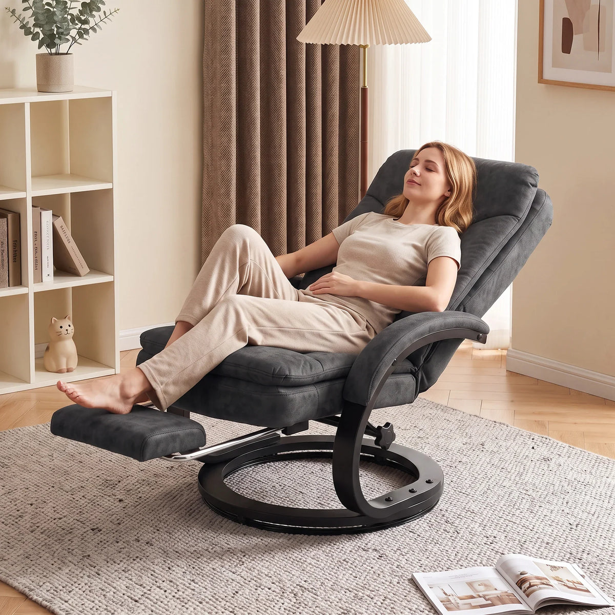 Gray velvet recliner chair with retractable footrest fully extended for lounging