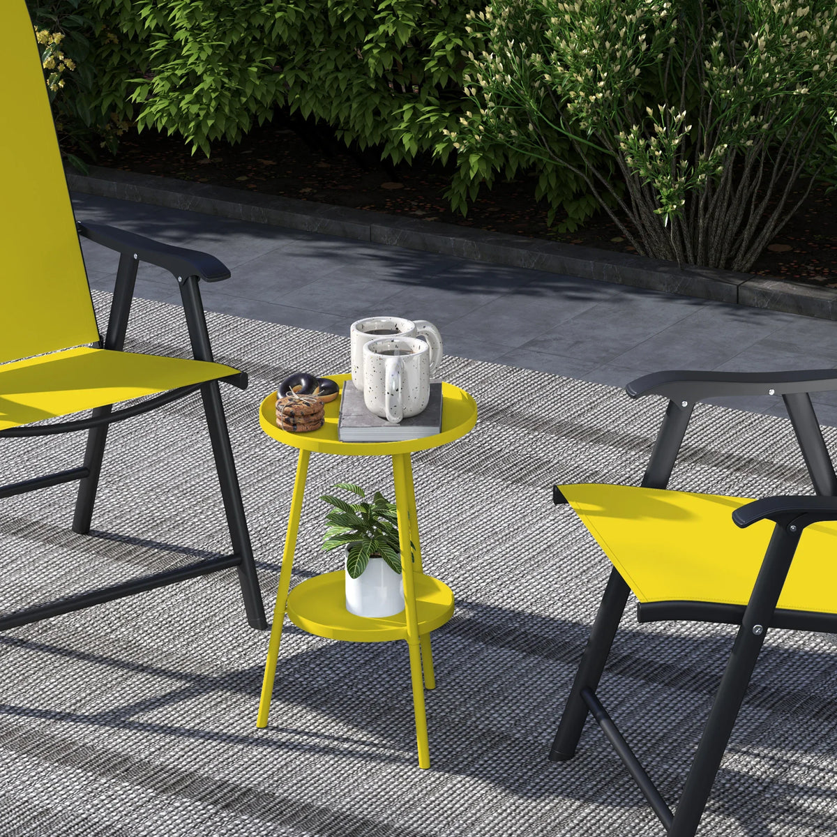 Yellow two-tier round metal side table with top tray and bottom shelf