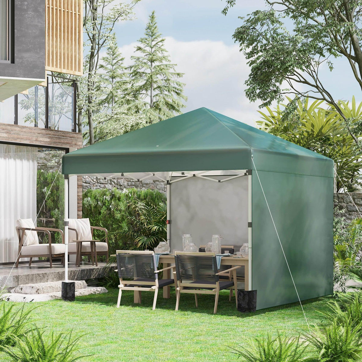 Green pop-up gazebo tent with gray sidewalls and open front, outdoor party cover