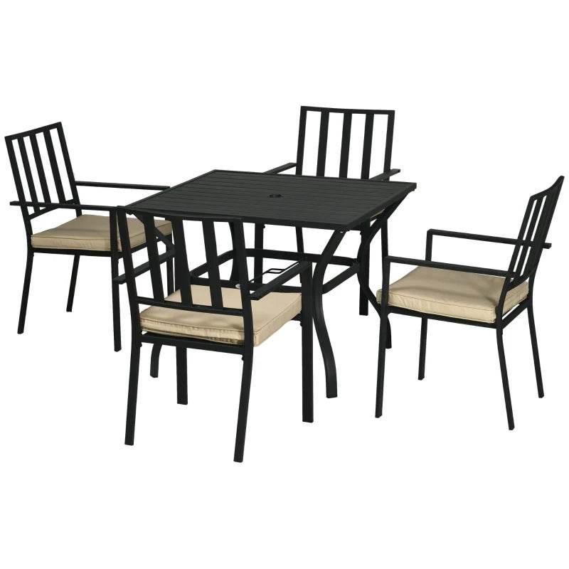 Outdoor dining table with four chairs, black metal frames, beige seat cushions