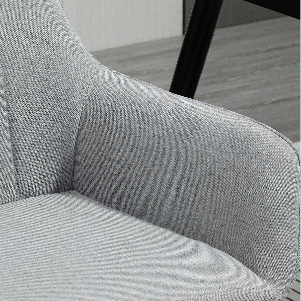 Light grey upholstered dining chair seat and backrest detail