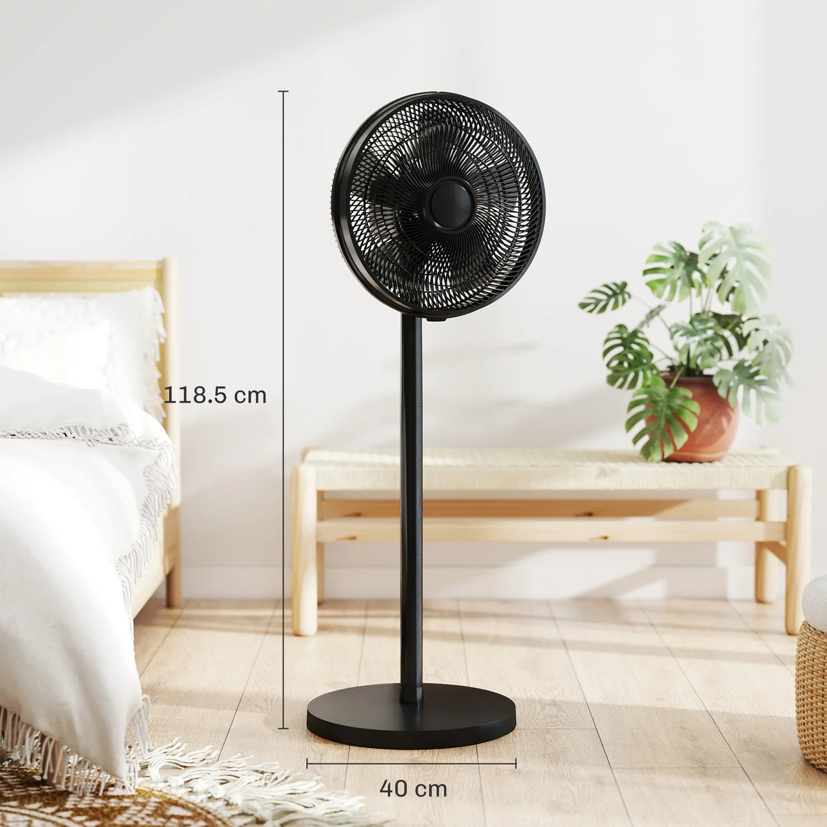 Black standing fan with round mesh head on pedestal base, shown with height markers