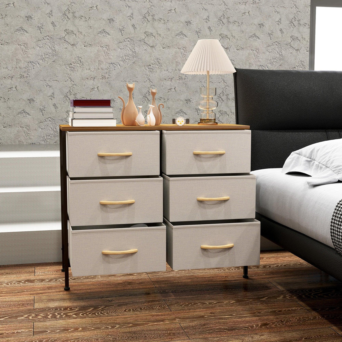 Cream fabric 6-drawer dresser with wooden top and gold-tone pulls, front corner view