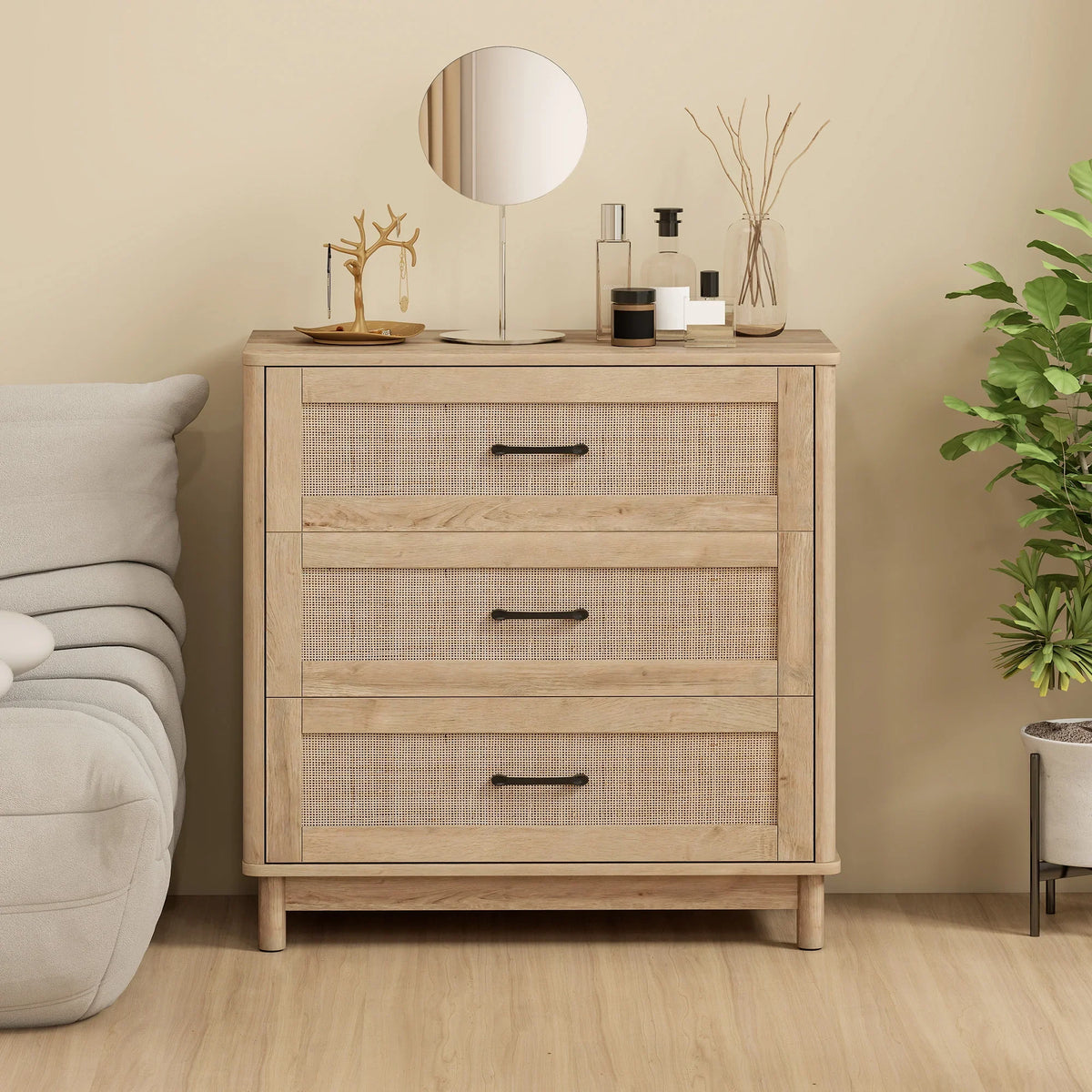 Light oak three-drawer dresser with rattan-front texture and bar drawer pulls