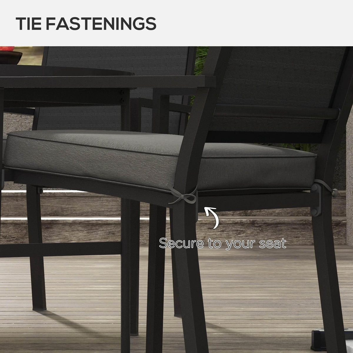 Charcoal grey seat cushion with tie fastener for secure attachment to a chair seat