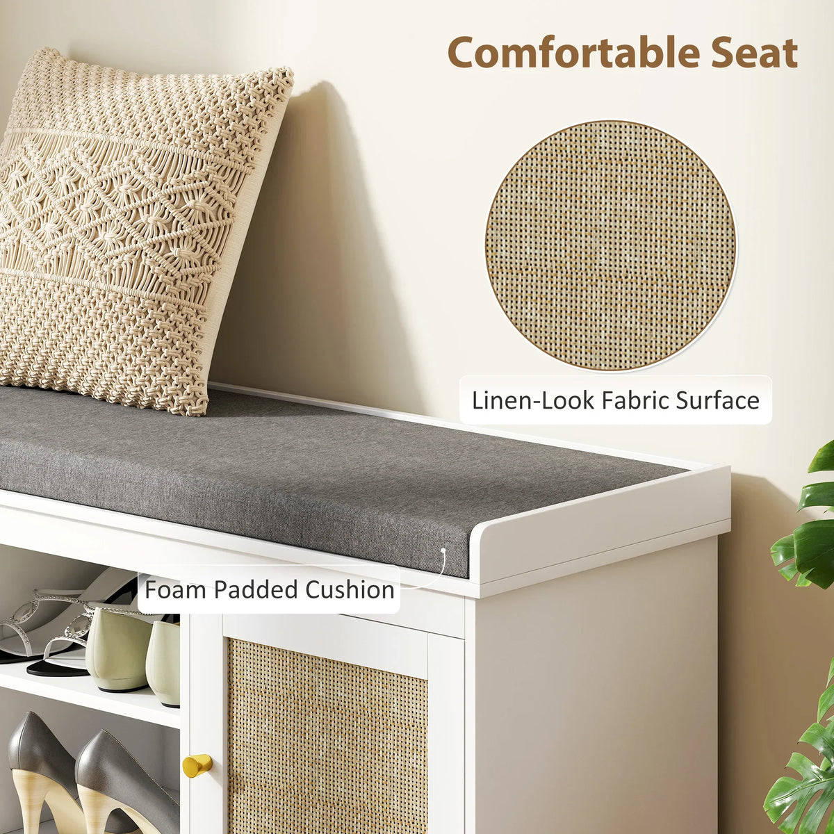 Foam padded gray cushion on white shoe storage bench with woven linen-look rattan doors