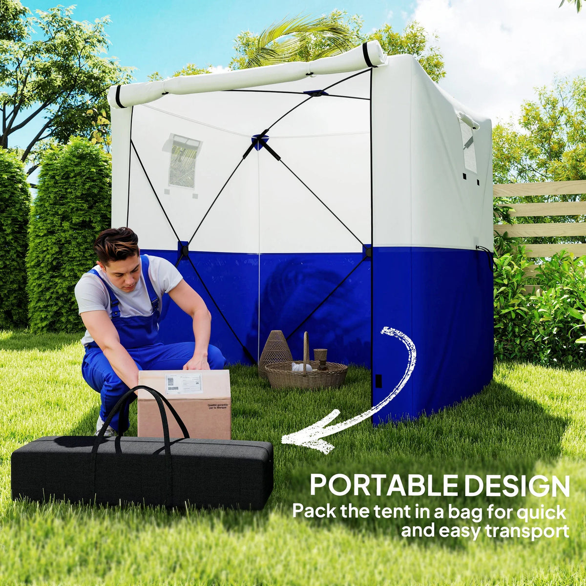 Pop-up gazebo with white and dark blue walls and triangular frame, person packing items
