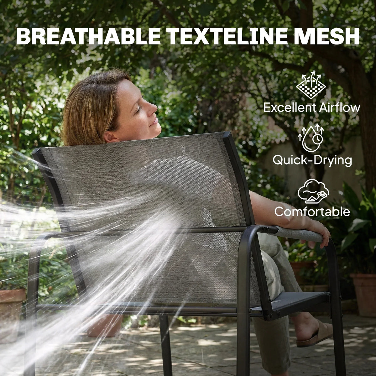 Grey outdoor armchair back with breathable mesh panel and black metal frame.