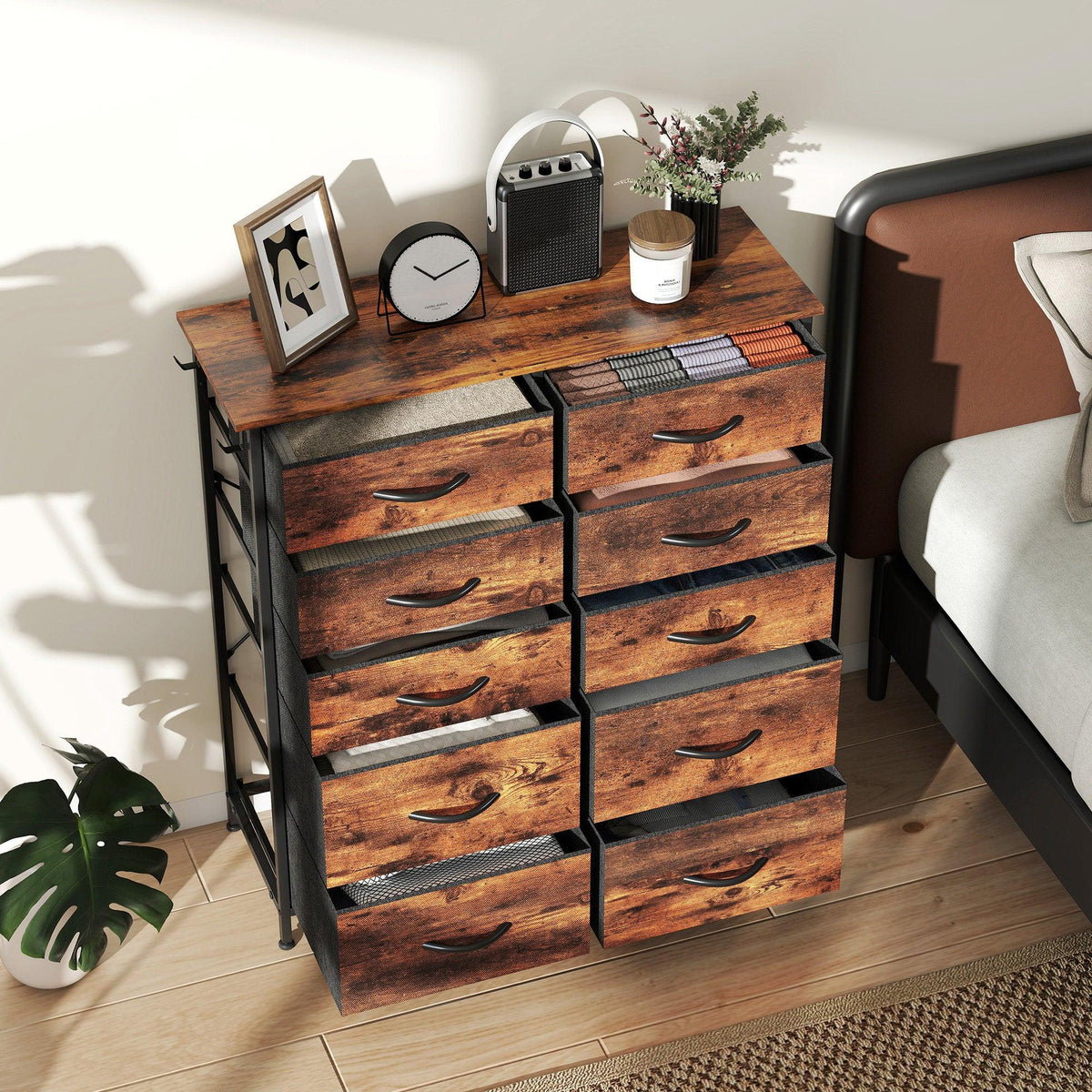 Rustic brown 10-drawer fabric chest with black steel frame and curved drawer pulls