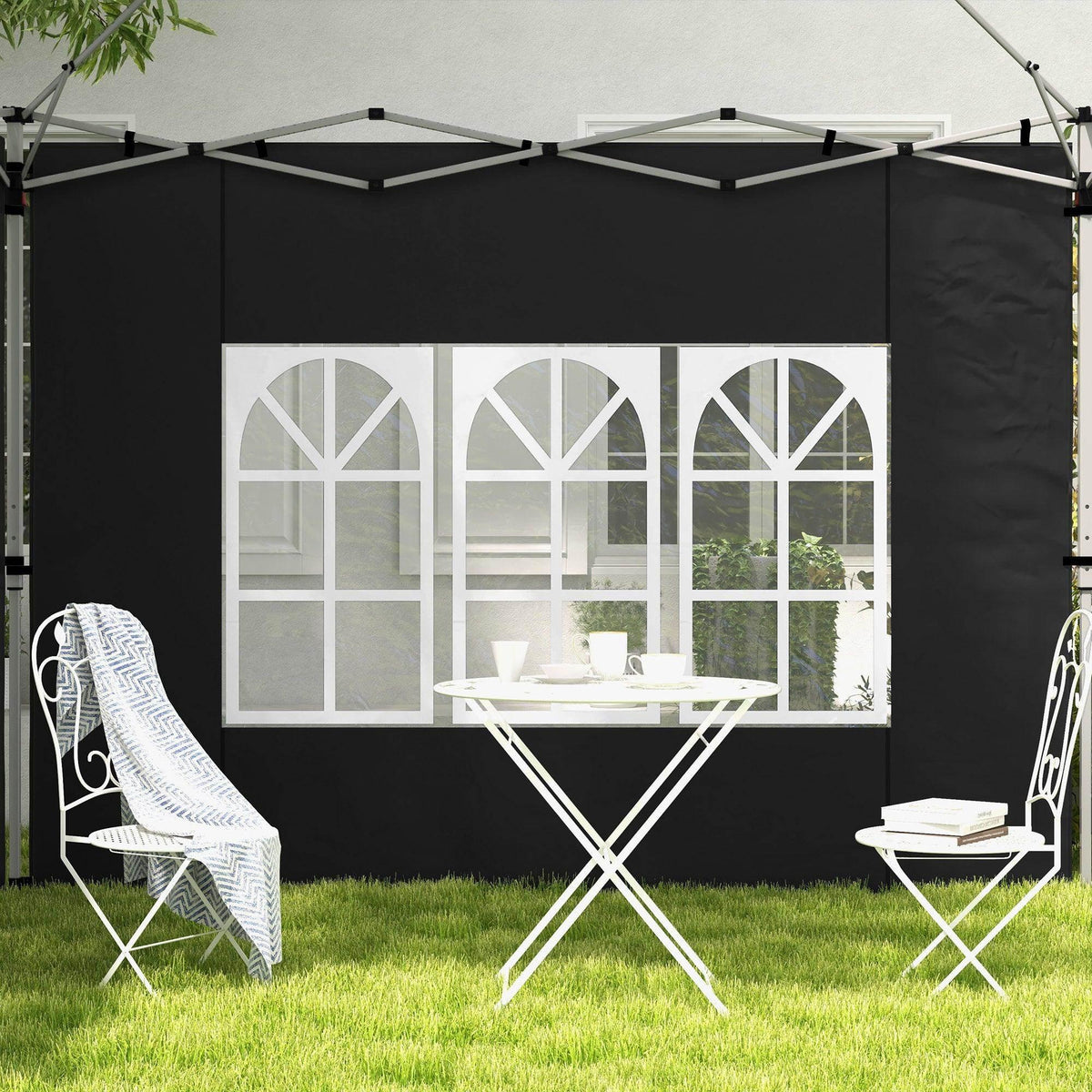 Black gazebo side panel with white arched window grid, privacy wall look