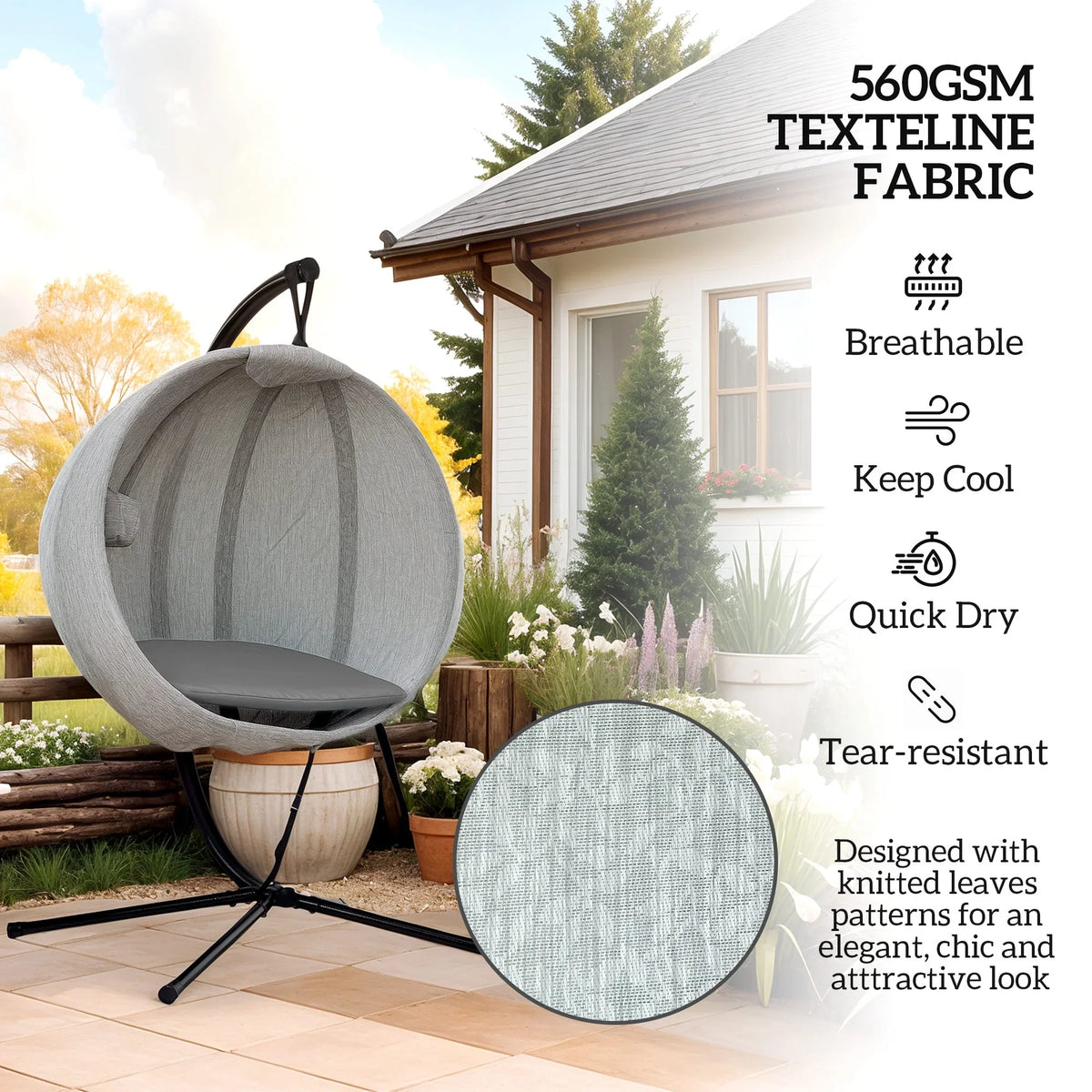 Grey hanging egg chair with canopy fabric and dark seat cushion on a sturdy stand