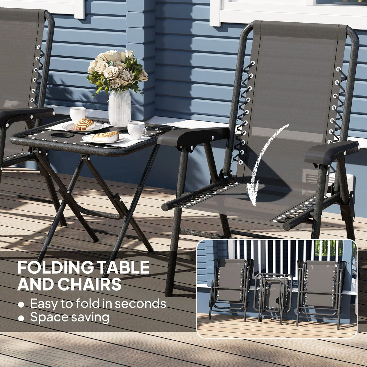 Black folding patio chairs with gray mesh backs and a small square folding table