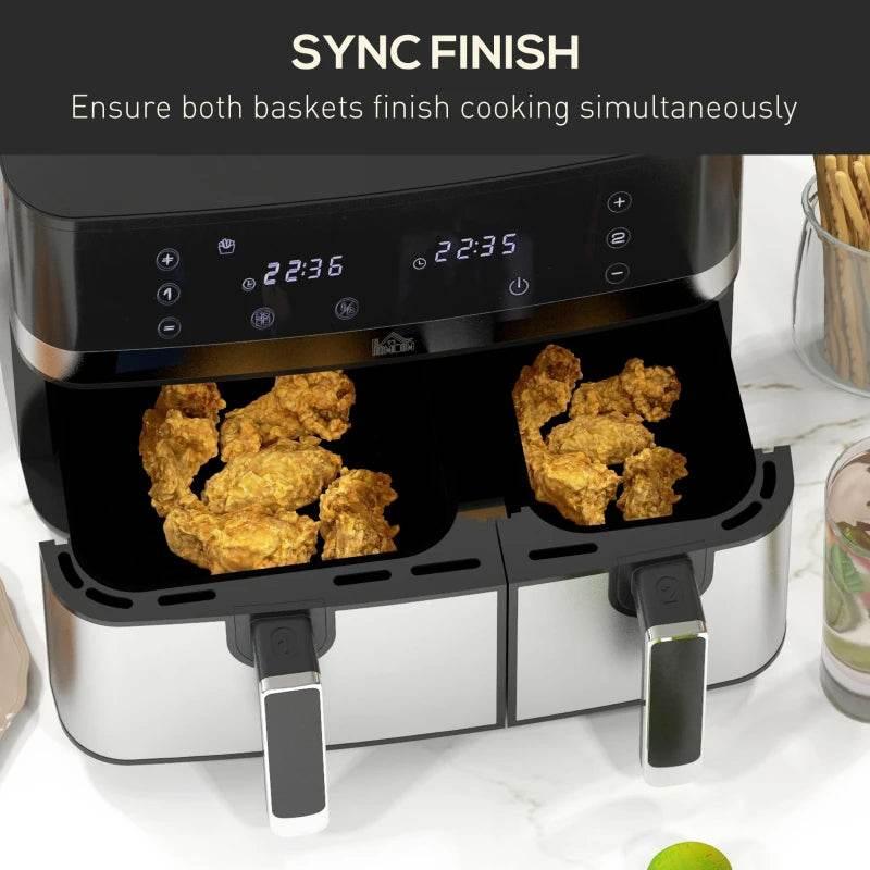 Dual-basket air fryer open with golden food in both baskets
