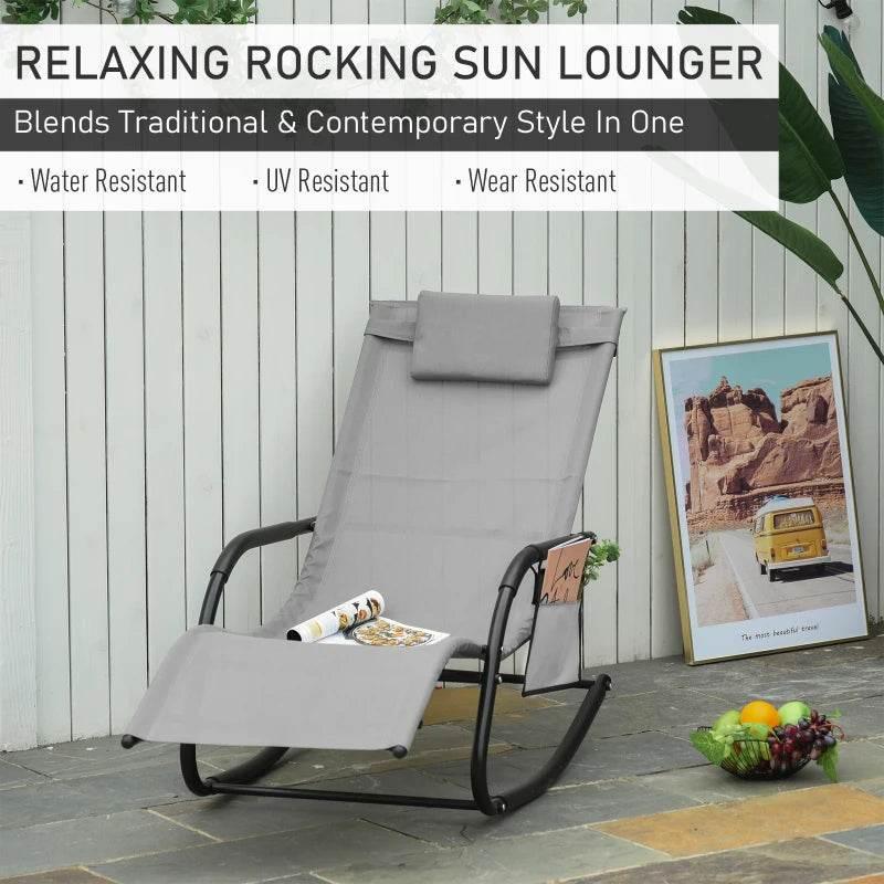 Grey rocking sun lounger with padded headrest and side storage bag for outdoor use
