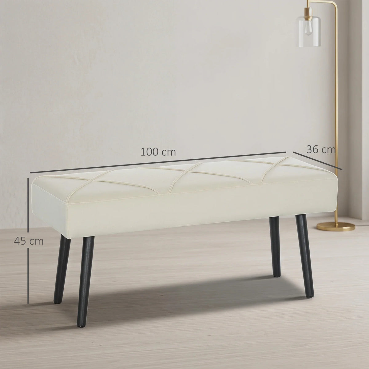Cream upholstered bench with arched stitch top and black steel legs