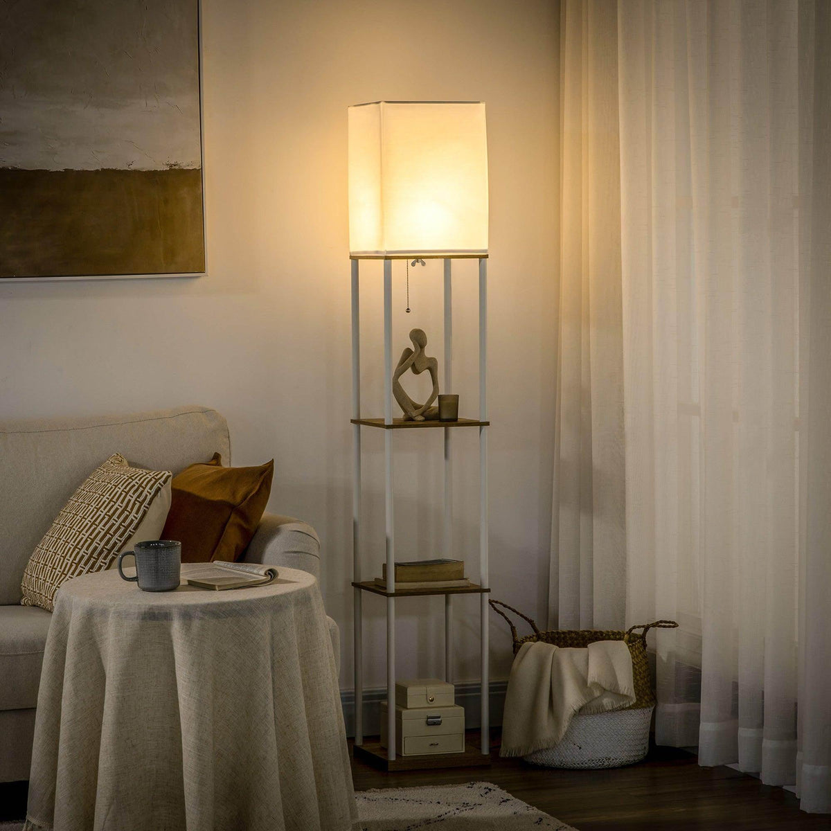 Modern floor lamp with beige fabric shade and two-tier wood shelves