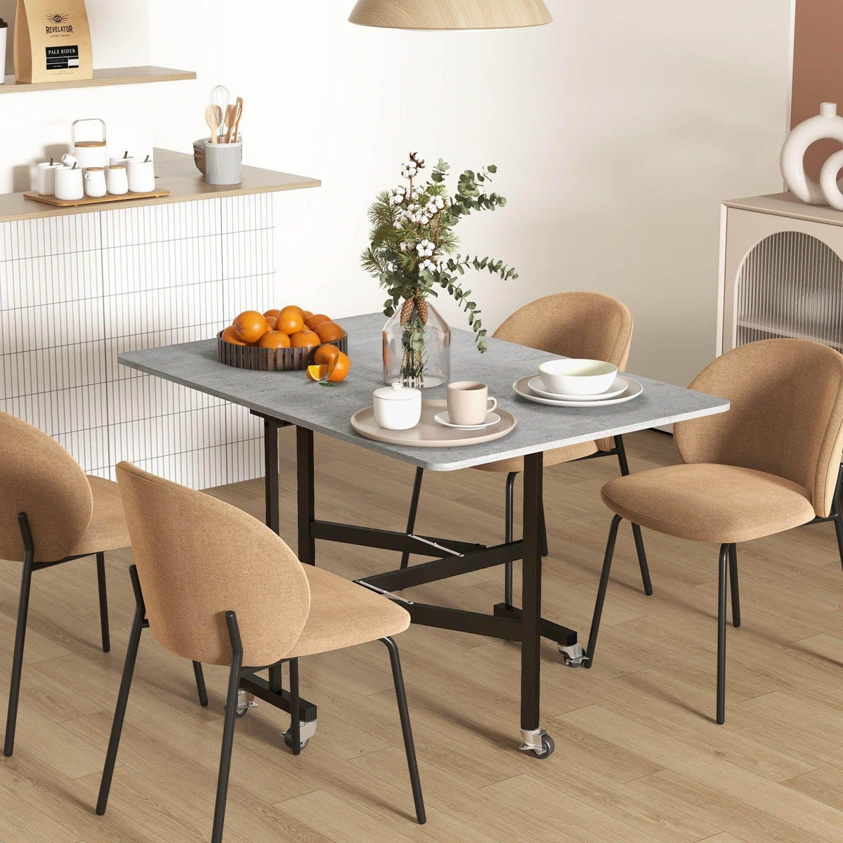 Grey drop-leaf folding dining table with two extension leaves and rolling caster legs