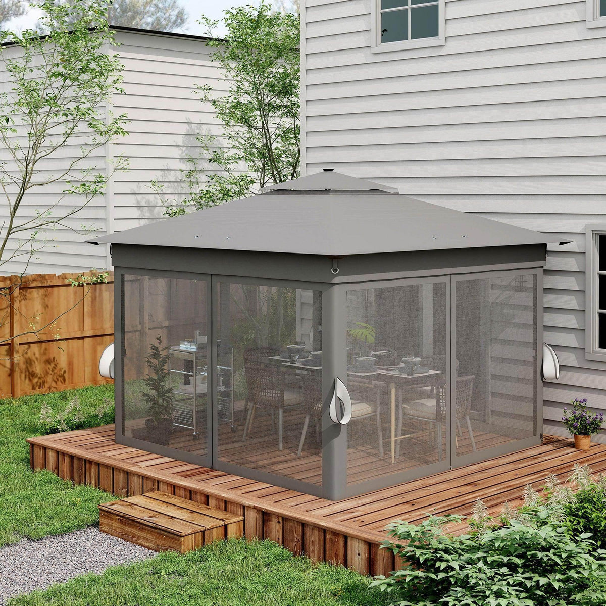 Grey screened gazebo tent with curtained windows on a wooden deck near a house