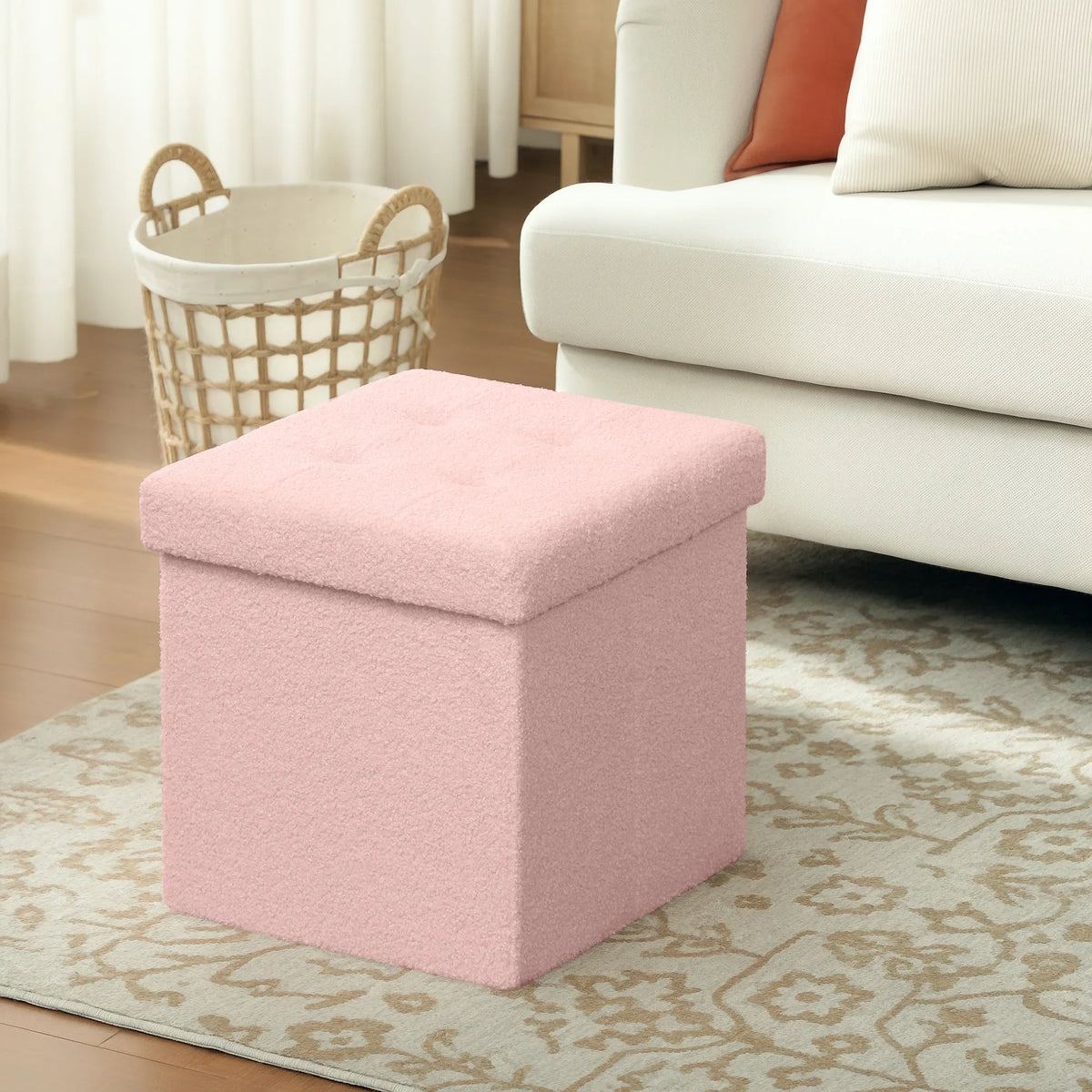 Pink sherpa fleece foldable storage ottoman with padded hinged top