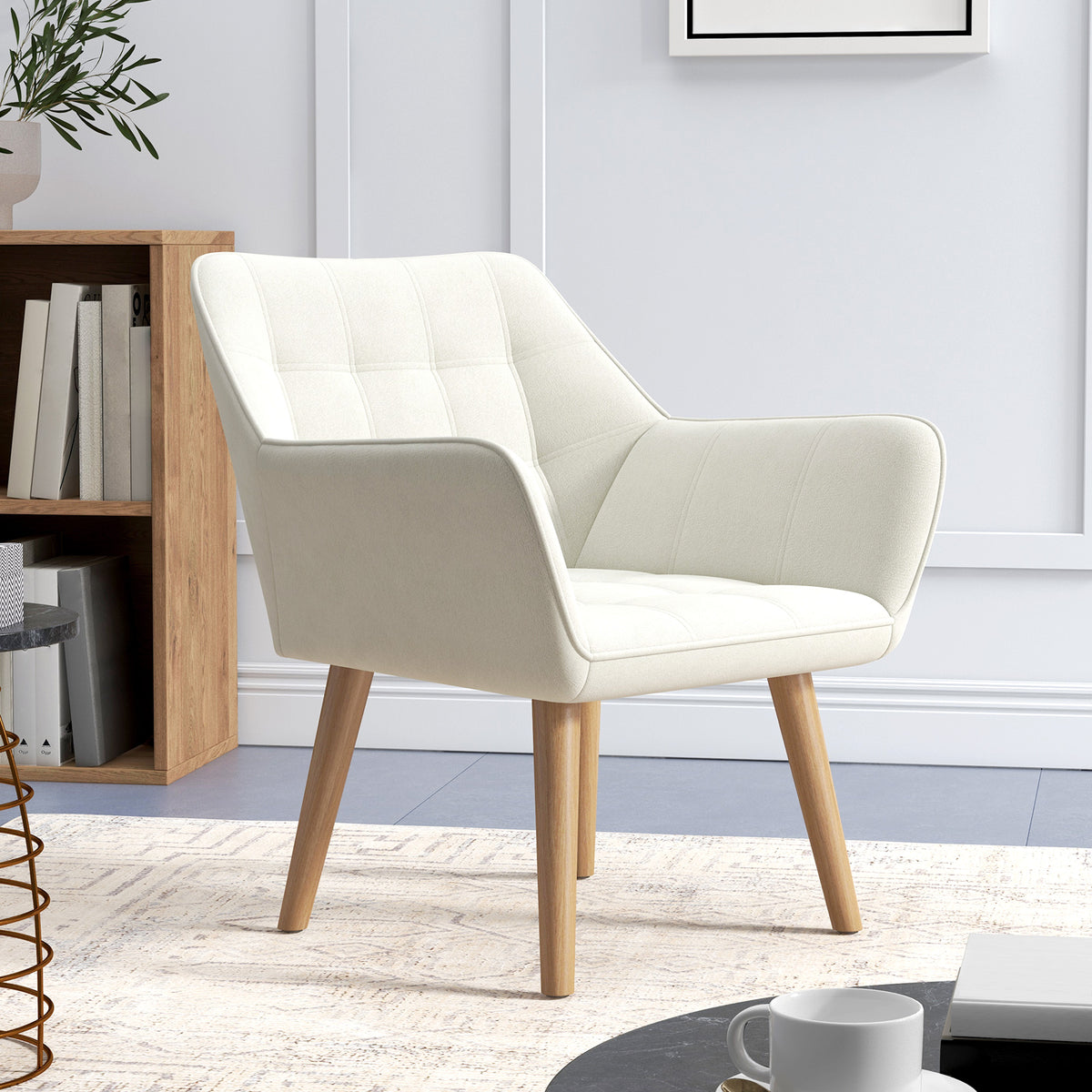 Cream accent armchair with slanted back, thick padding, and rubberwood legs