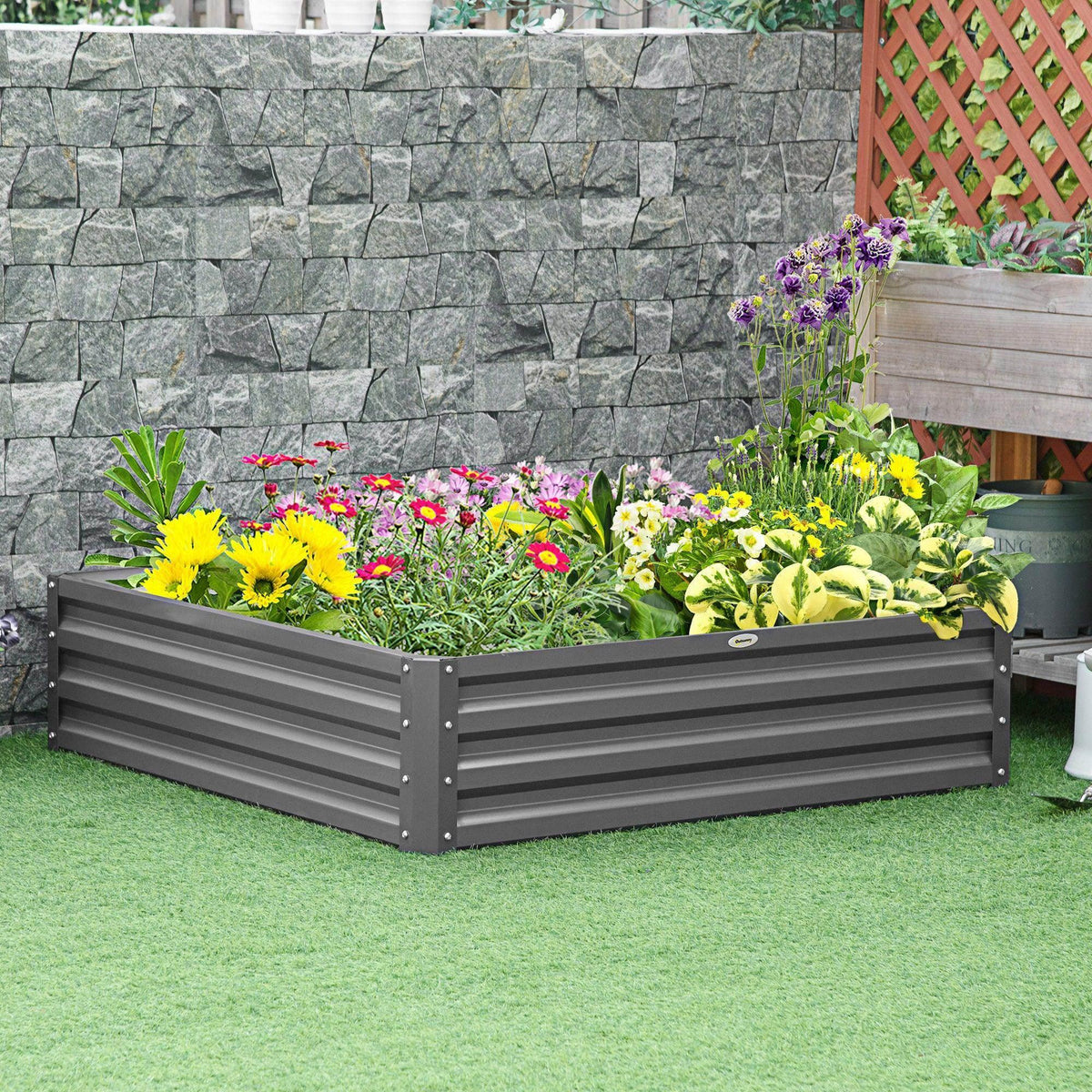 Light grey raised garden bed box with steel slat sides and open top planter