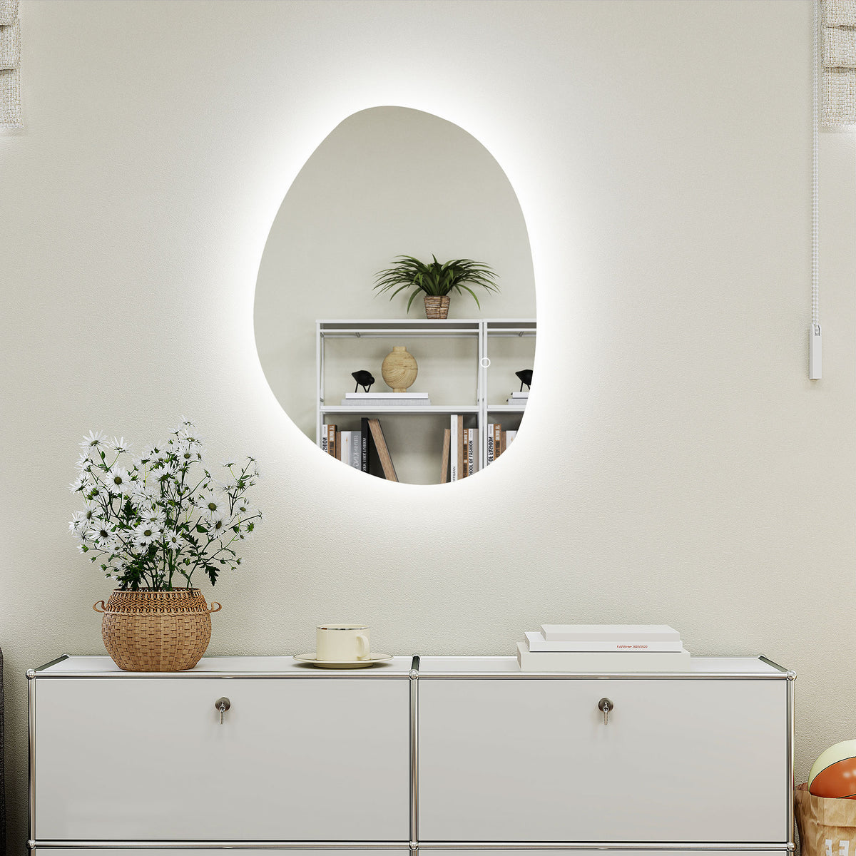 Oval LED bathroom mirror centered above console, emitting a continuous backlight ring.