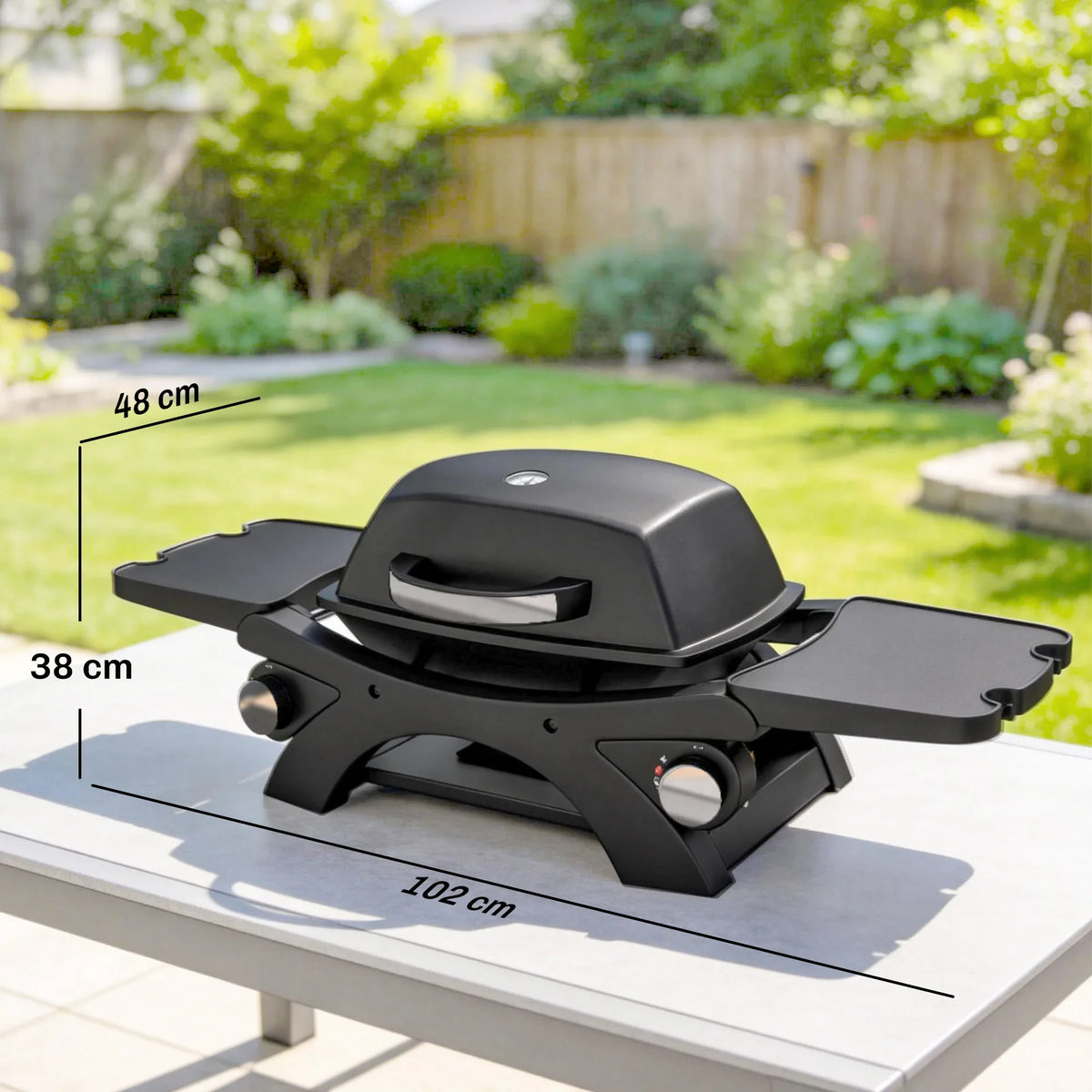 Black 2-burner gas grill with side tables and control knobs on outdoor patio
