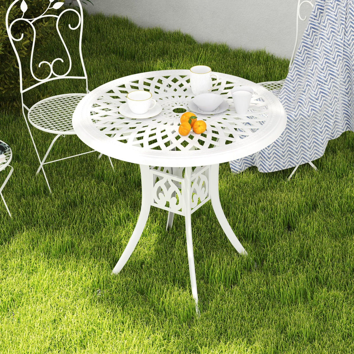 White round garden dining table with cutout lattice top and umbrella-hole opening
