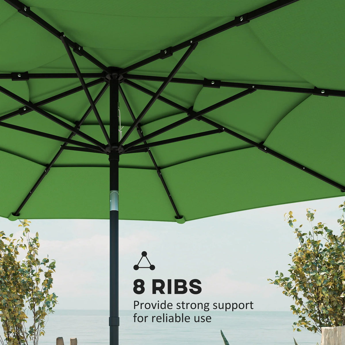 Green 3-tier garden parasol canopy close-up with black support ribs
