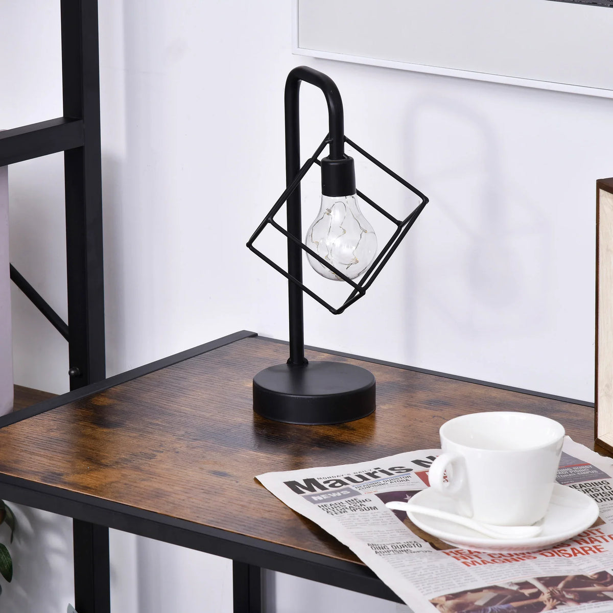 Industrial side table surface with lamp and magazine, black metal frame and chestnut drawer