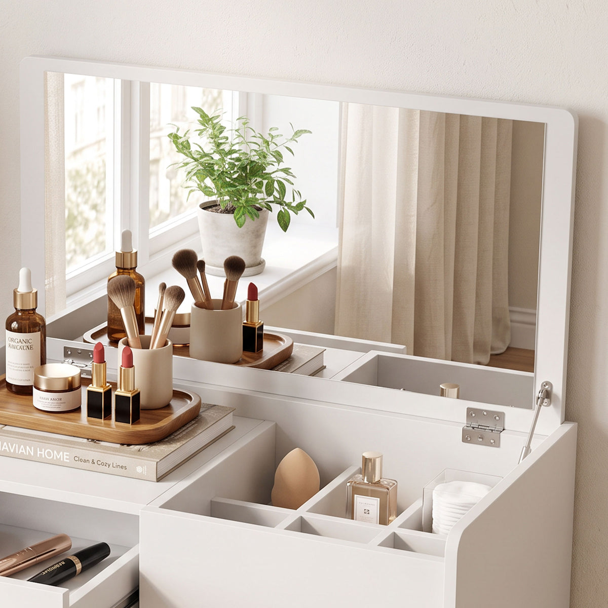 White vanity desk with large mirror and partitioned compartments for cosmetics