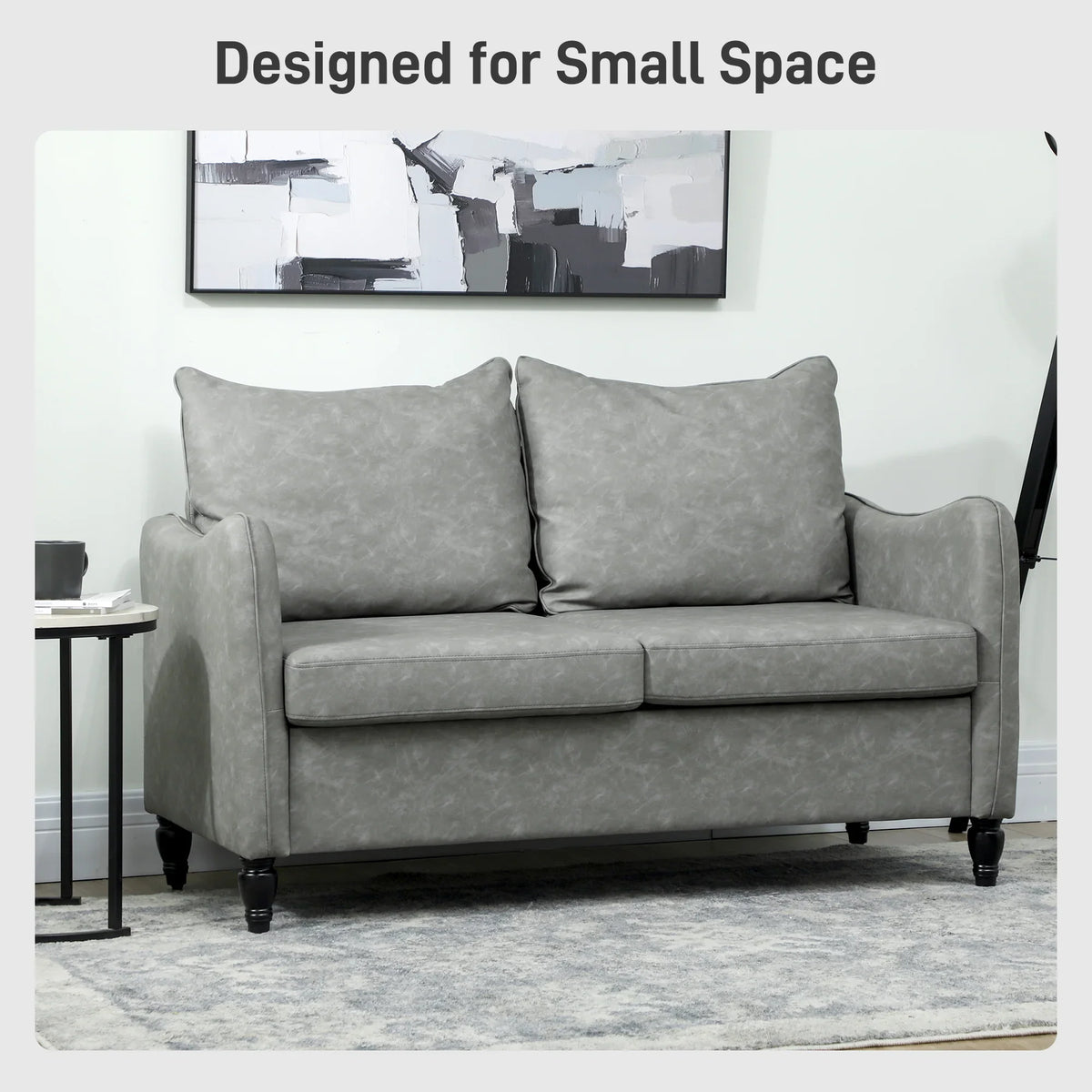 Grey two-seater sofa with two back cushions and thick, wide seat padding