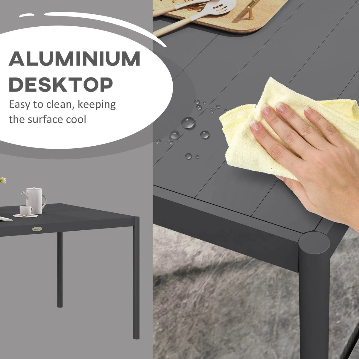 Dark gray aluminium tabletop with rounded corner post and water-bead cleaning detail
