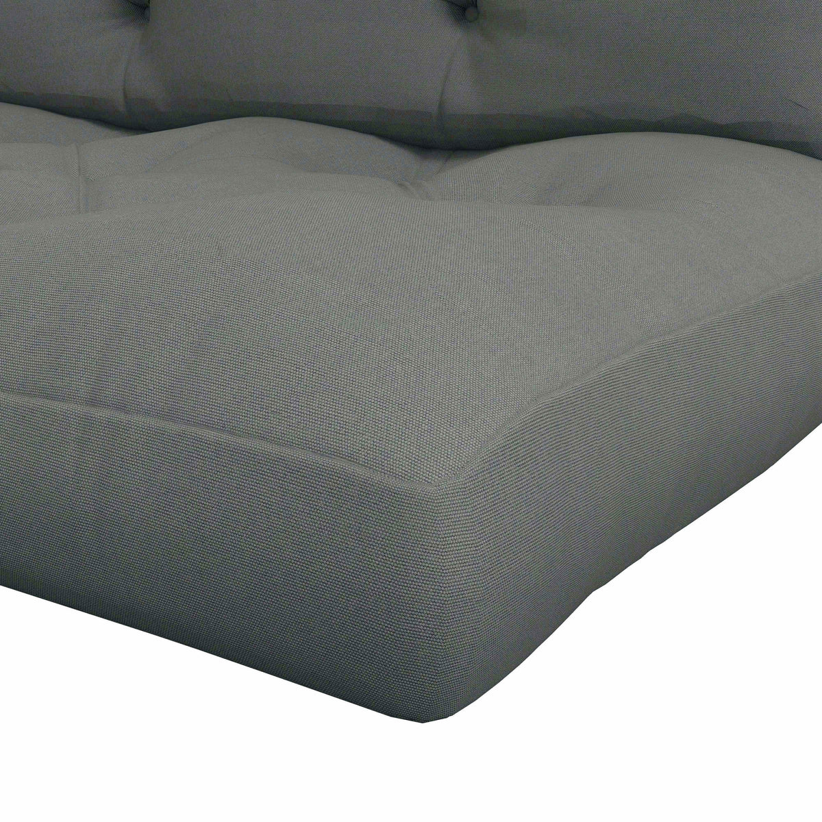 Close-up of grey cushion pad corner with smooth fabric and stitched edges