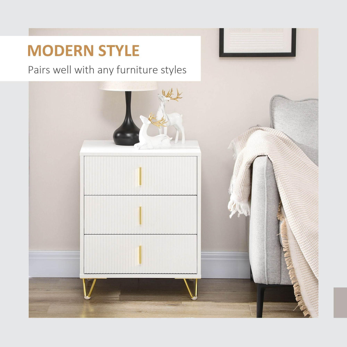 White three-drawer storage unit with gold handles, styled with decor on top