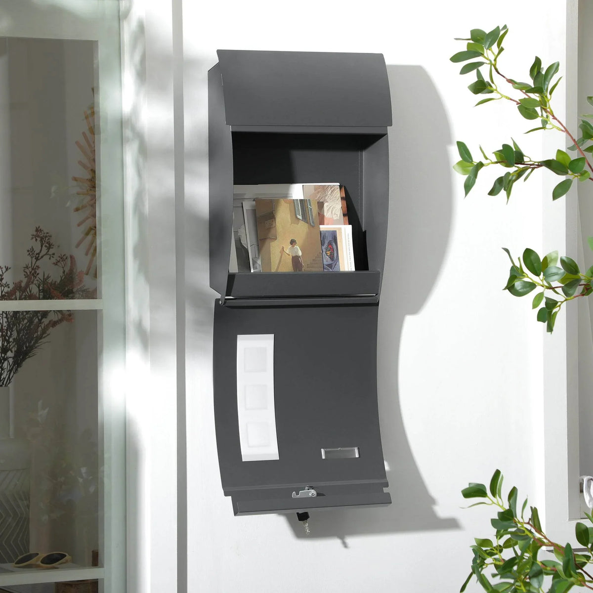 Wall-mounted anthracite mailbox with open top compartment and frosted viewing window