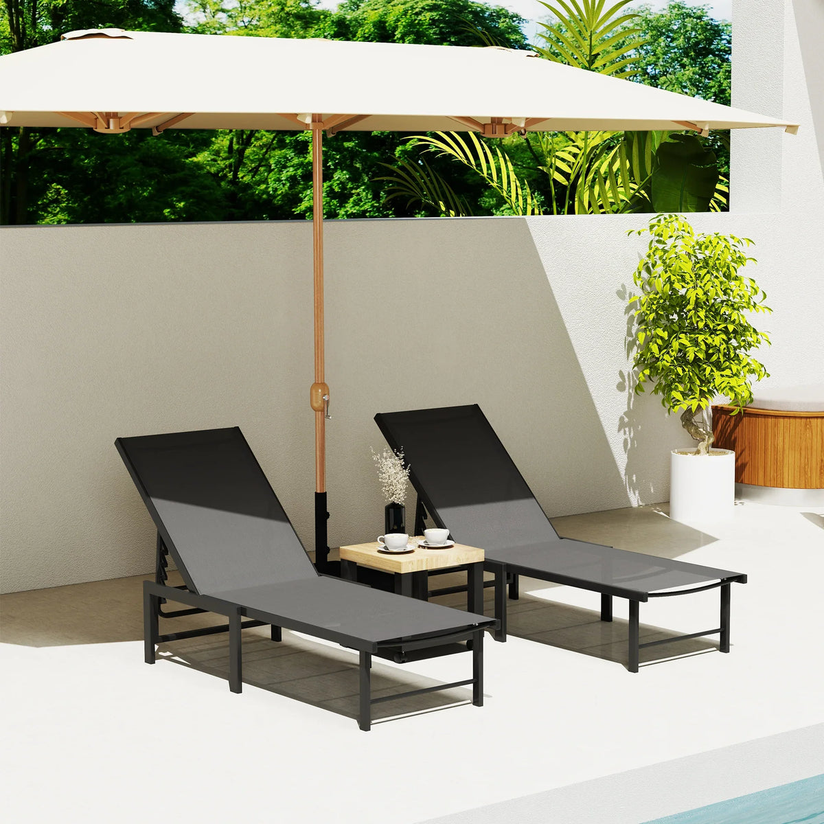 Two dark reclining sun loungers with adjustable backrests under patio canopy