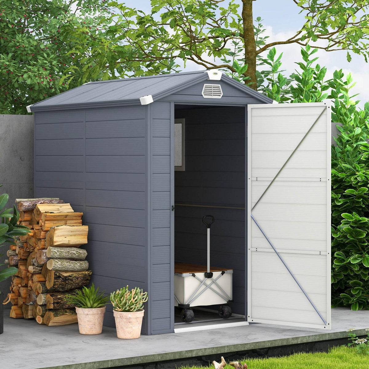 Grey polypropylene outdoor storage shed with hinged double doors and visible ventilation vent