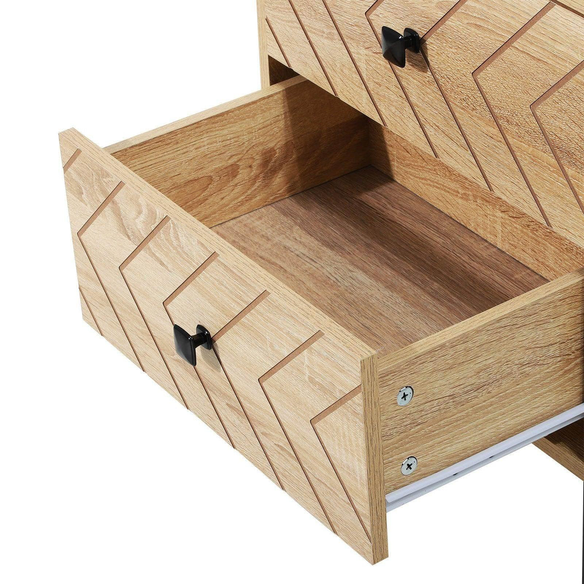 Open drawer interior of wood nightstand with geometric drawer fronts