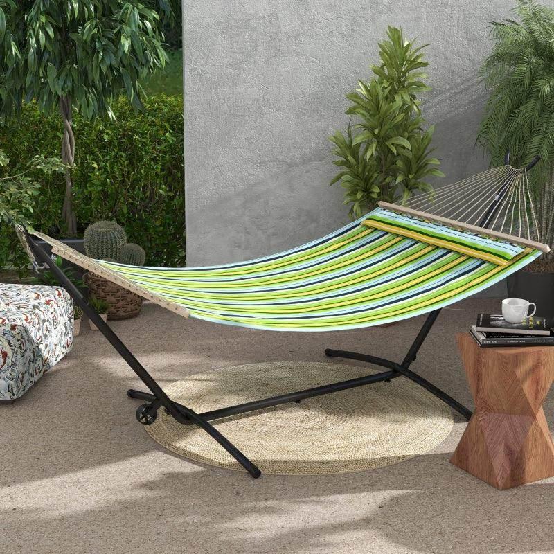 Black portable hammock stand with wheels, supporting a multicolor striped hammock