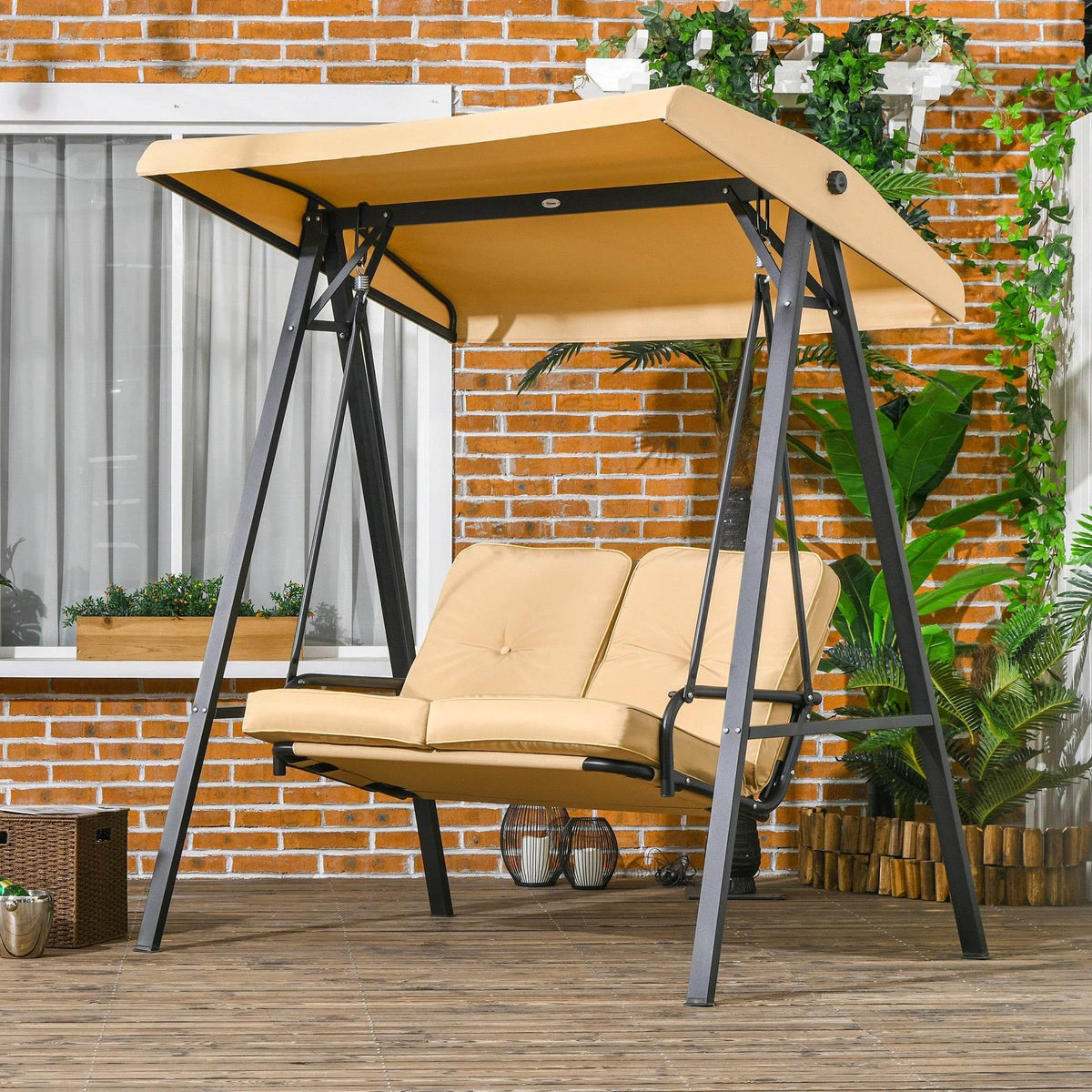 Beige two-person garden swing bench with adjustable canopy and padded seat cushions