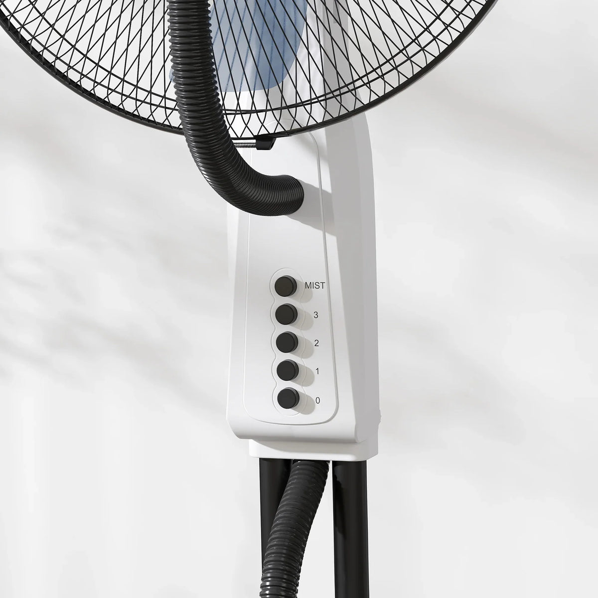 White misting floor fan control panel with mist buttons and black hose